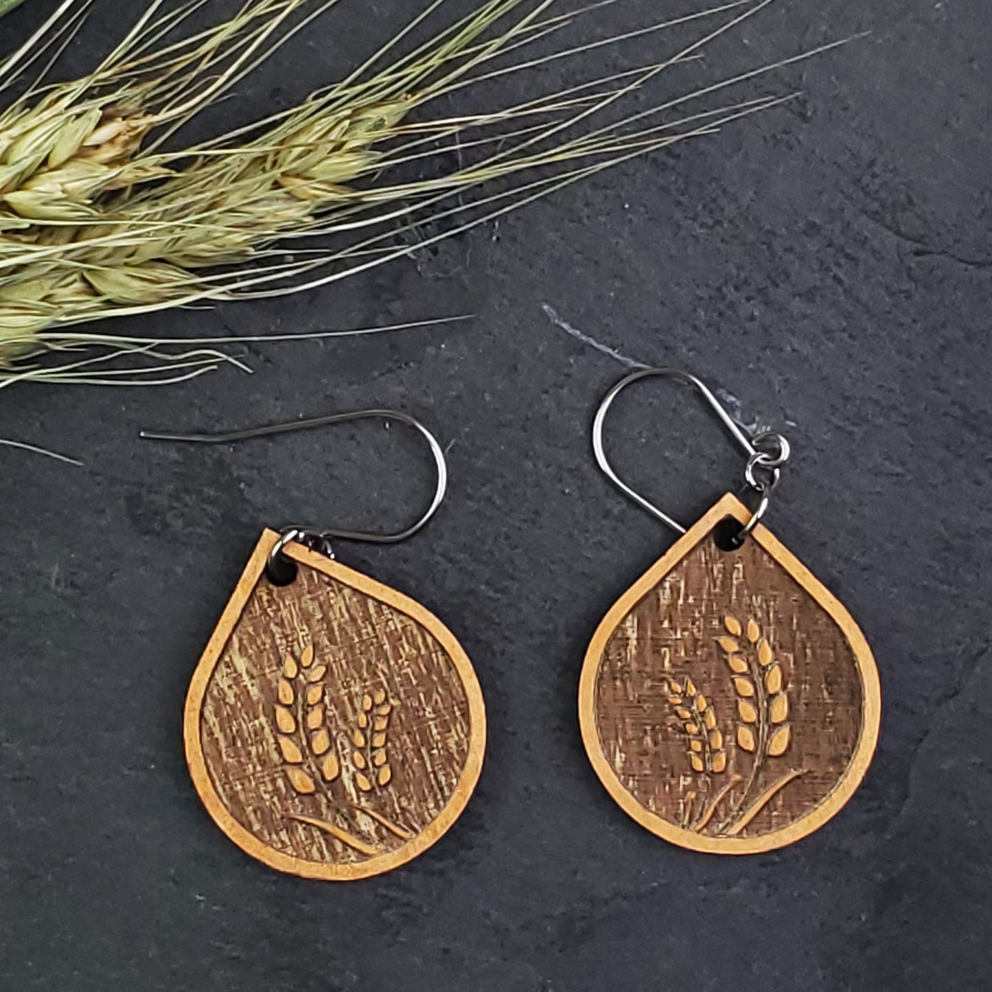 Bronze Wheat Wood Engraved Dangle Earrings - A Farm Girl by Tess | Handmade Alpaca Wool Winter Hats for Women